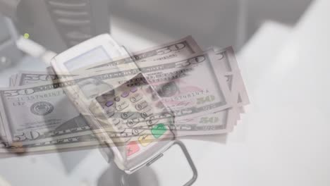 Animation-of-american-dollar-banknotes-and-payment-terminal