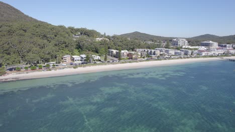 Aerial-View-Of-Shoal-Bay-Clear-Water-During-Summer-In-NSW,-Australia