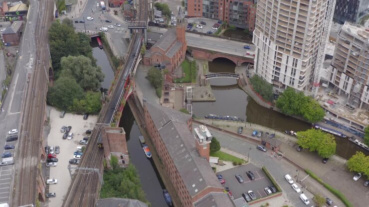 Drone Shot Tracking Train Travelling Through Castlefield Canals 01