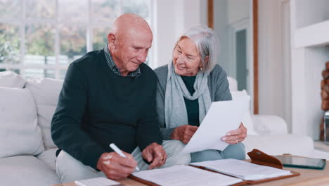 senior couple, documents and bills for home