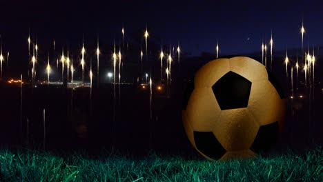 Animation-of-glowing-lights-at-nights-sky-over-football-ball