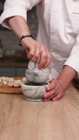 chef using a mortar and pestle