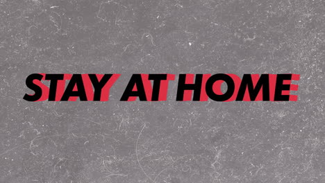 words be safe stay at home written in black and red letters with red stripes on grey background.