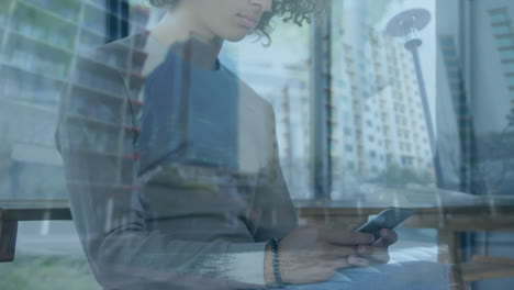 animation of man using smartphone over cityscape