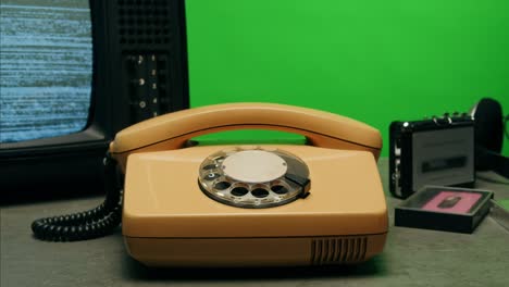 retro vintage phone, a yellow rotary telephone is displayed on a wooden desk, adding a nostalgic touch