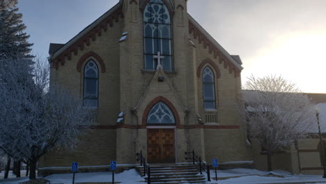 Front-of-church-exterior--day.-snow--winter