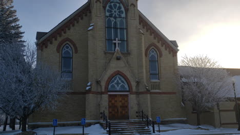 front of church exterior  day. snow  winter