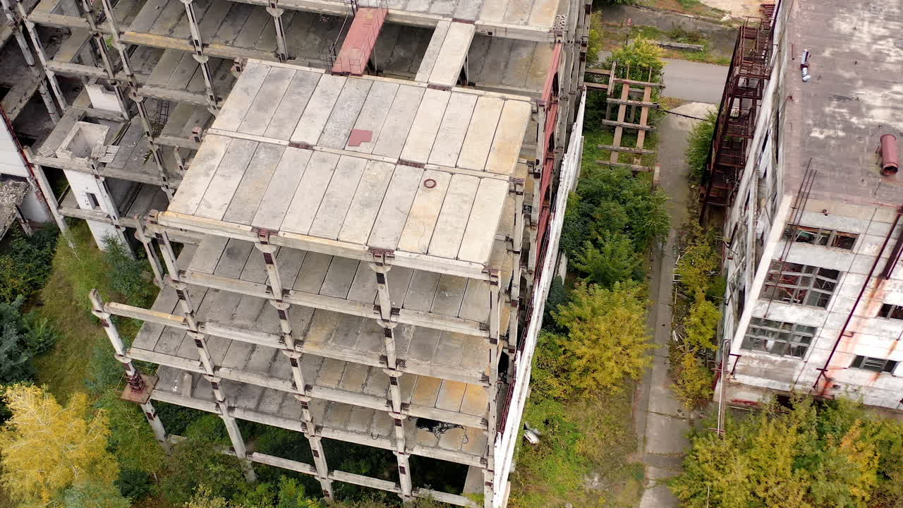 Ruined broken city construction industry. Old destroyed industrial building.