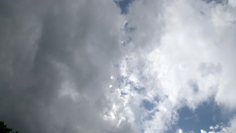 nature storm clouds parting blue sky