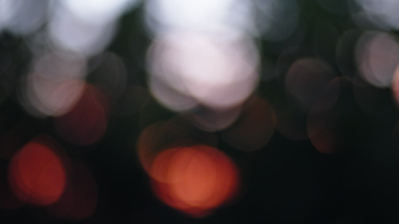 Blurred bokeh lights, soft warm tones creating a peaceful, dreamy effect