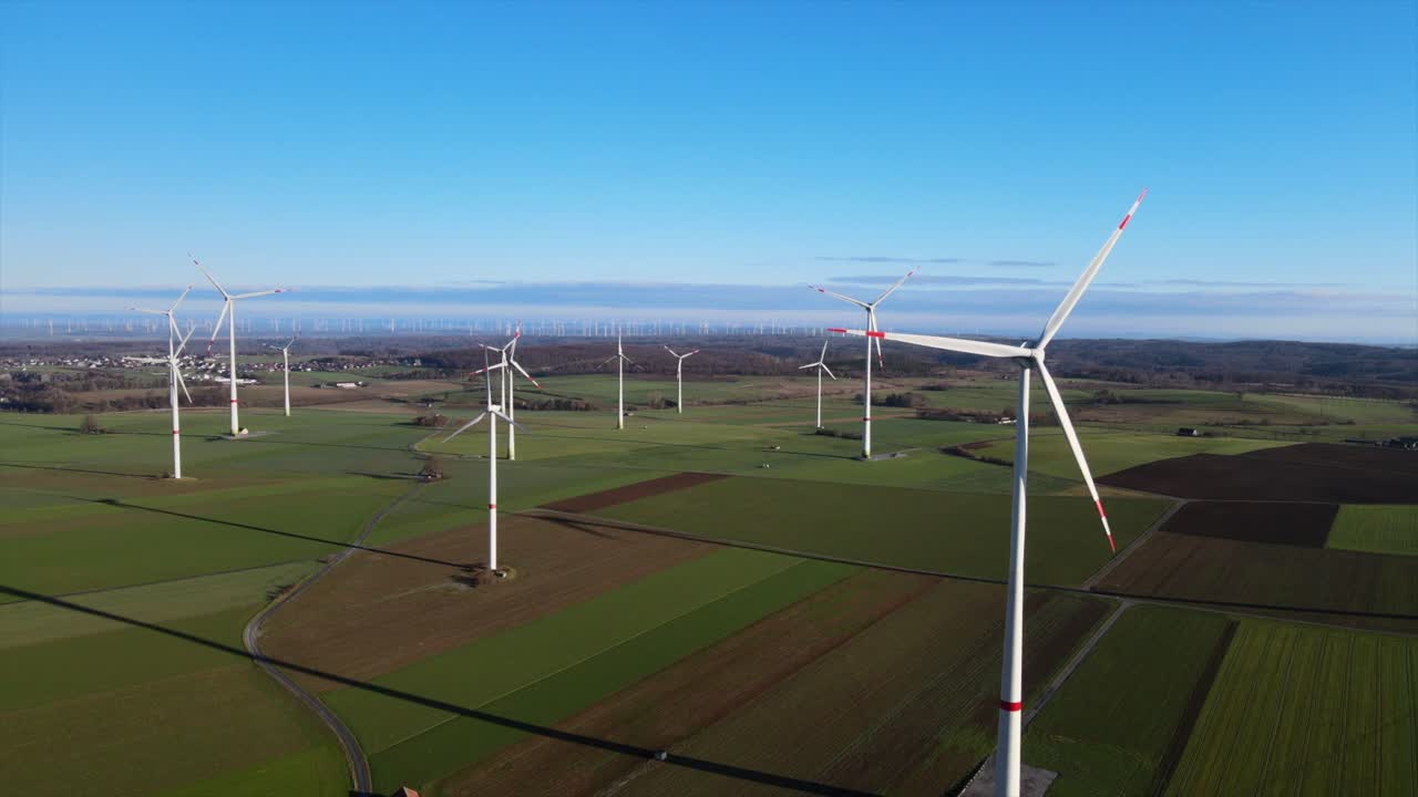 Harnessing the Power of the Wind: Aerial View of Wind Turbines Generating Renewable Energy on a Sunny Day in Brilon, Sauerland, Germany