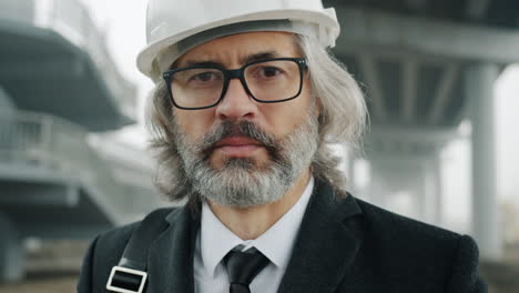 engineer in front of a bridge