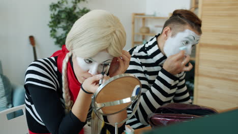 Mime Artists Preparing for a Performance