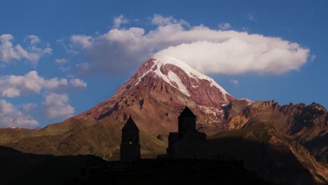 mount kazbek dramatic establishing aerial view, sunrise