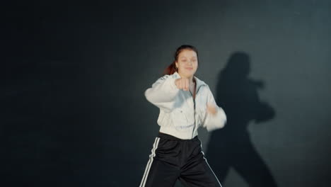 teenage girl performing street dance