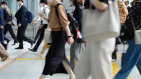 Slow-motion-crowd-of-people-walking-on-street