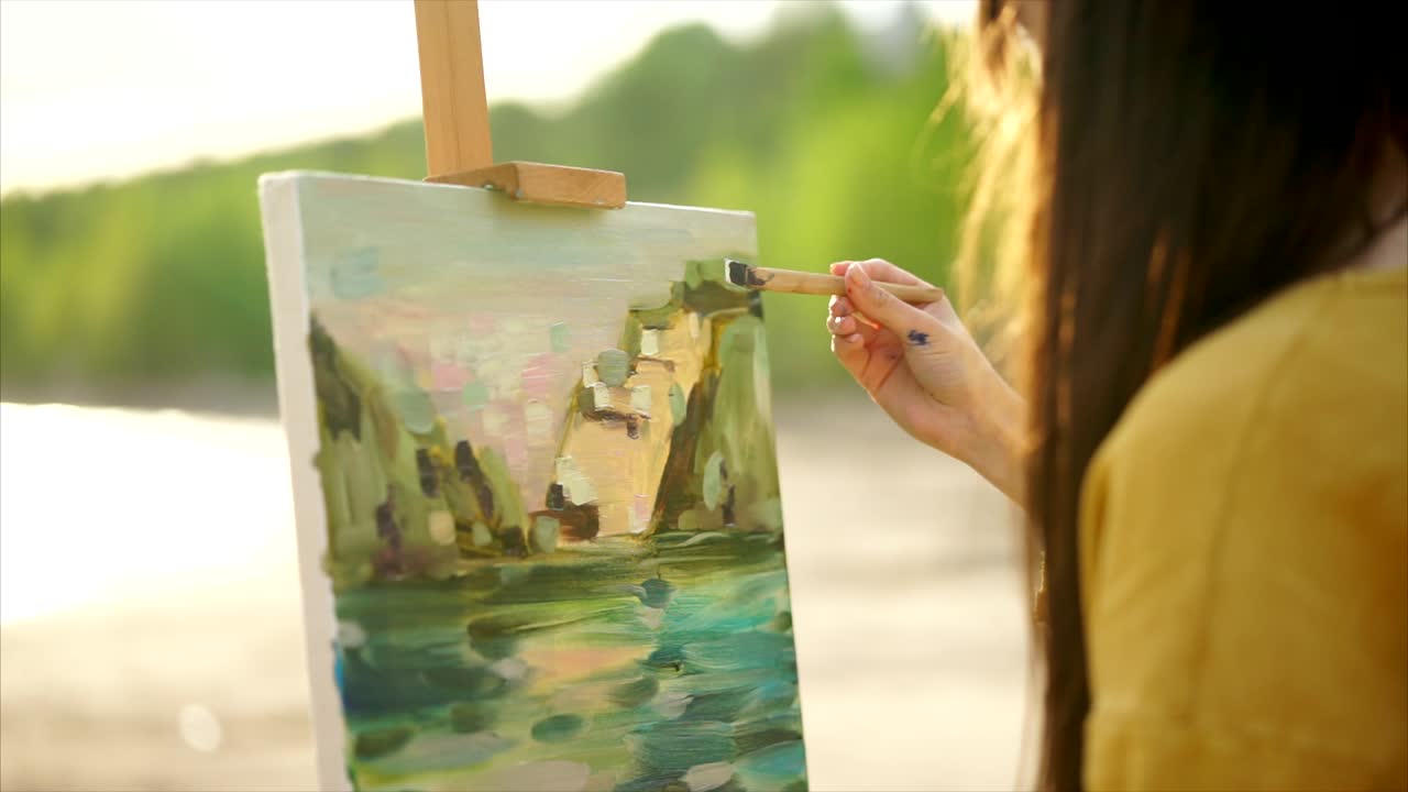 Woman Painting a Landscape