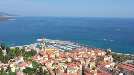 Basilica-of-Saint-Michel-Archange-and-harbour-of-Menton-aerial-view-sunny-day
