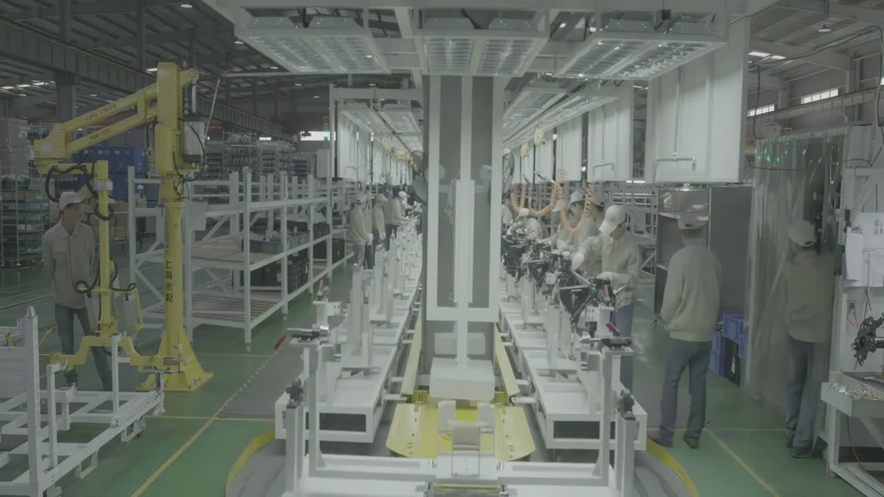 Time lapse mechanic car factory workers assembling vehicle engineer plant. Car part assembling process a vehicle body production line at a modern cars manufacturing facility