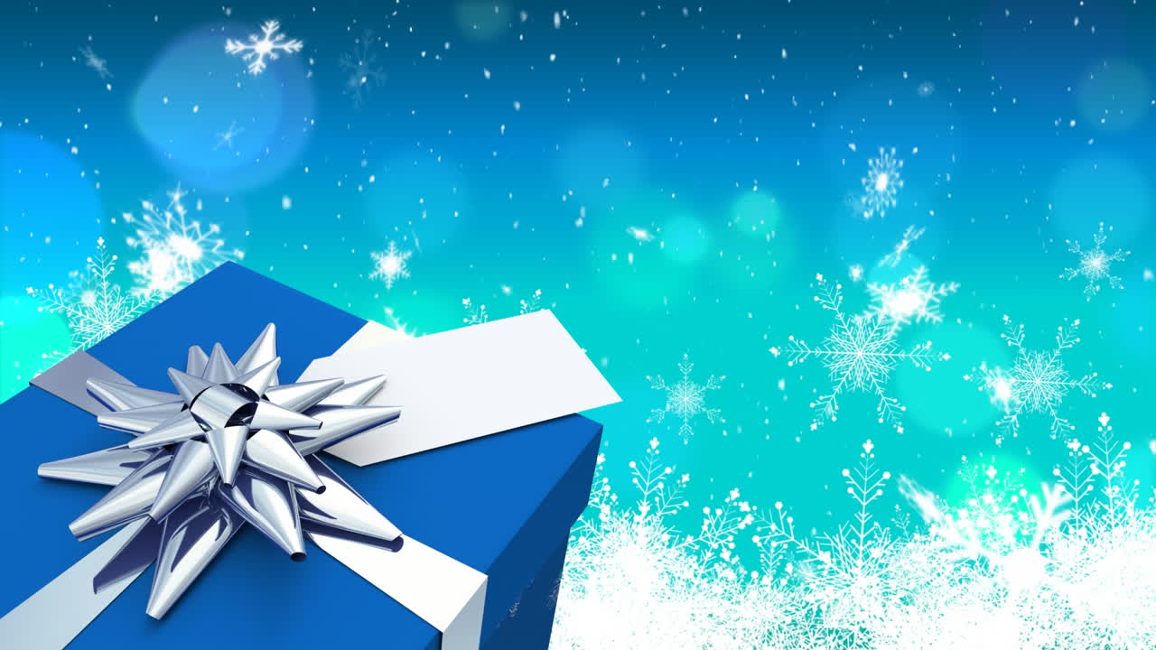 la nieve cayendo y el regalo de navidad