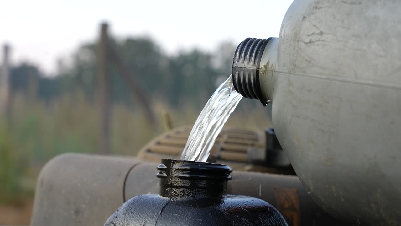 Filling up a tank with gasoline