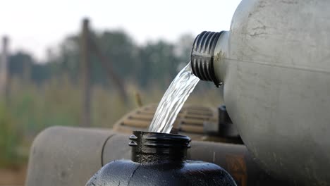filling up a tank with gasoline