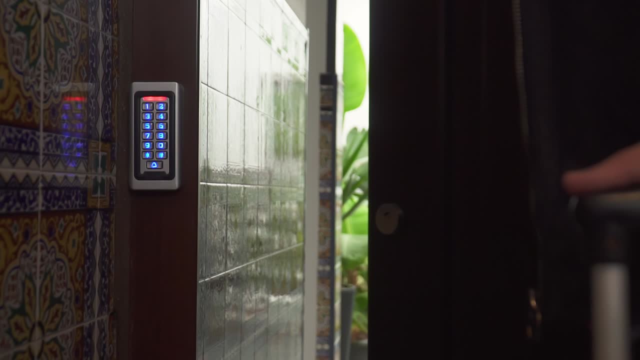 Couple Unlocking Their Home's Door Password Coming Back From Trip