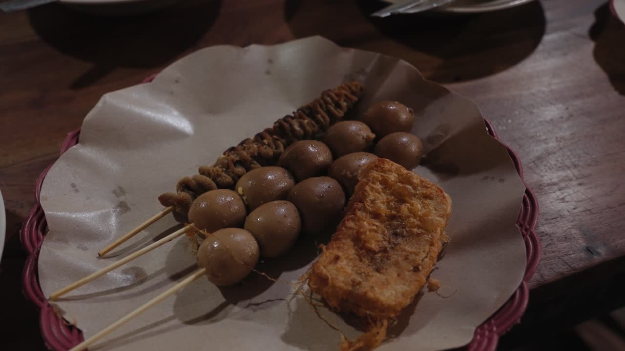Indonesian Street Food Skewers with Quail Eggs and Fried Tempeh