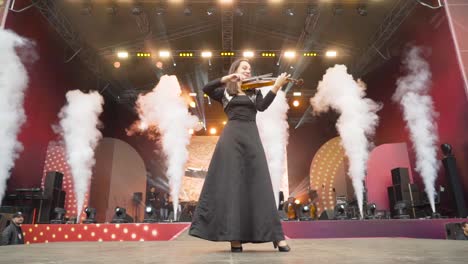 violinist performing on stage