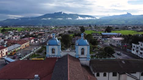 aerial view aloasi church volcanic peaks of pasochoa sincholagua ecuador