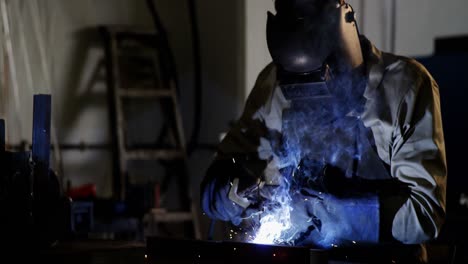 Welder-welding-a-metal