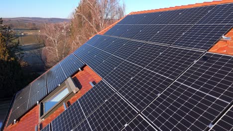 PV-Cells-On-The-Roof-Of-A-House---Drone-Shot