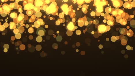 partículas de oro voladoras y bokeh redondo en fondo oscuro