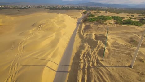 drone view of the road across medanos de coro national park, in falcon, venezuela