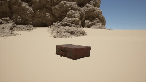 vintage suitcase abandoned in the desert