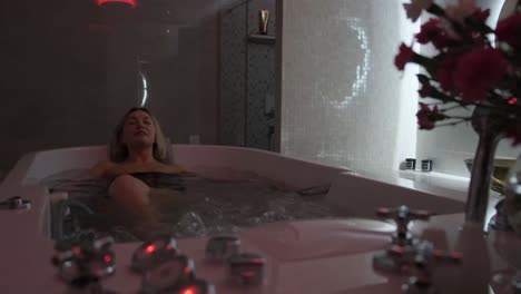 beauty and healthy treatments in sauna, blonde woman in felt hat relaxing in steam bath, recovery vitality and releasing stress, relaxation in spa center, traditions for healthy lifestyle