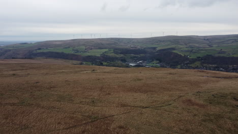 aerial flying over beautiful fields, landscape shot with hills and fields