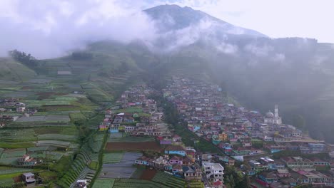 misty mountain township in nepal, aerial drone view