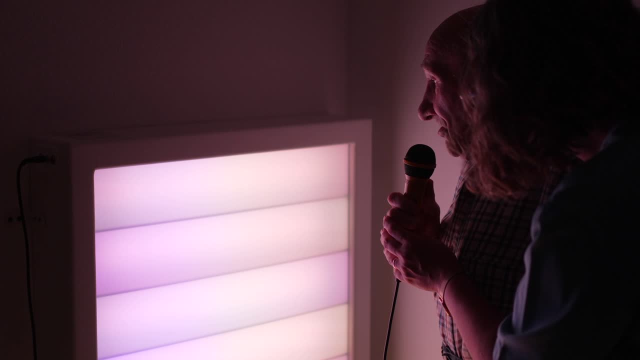 Senior Man Enjoying Karaoke