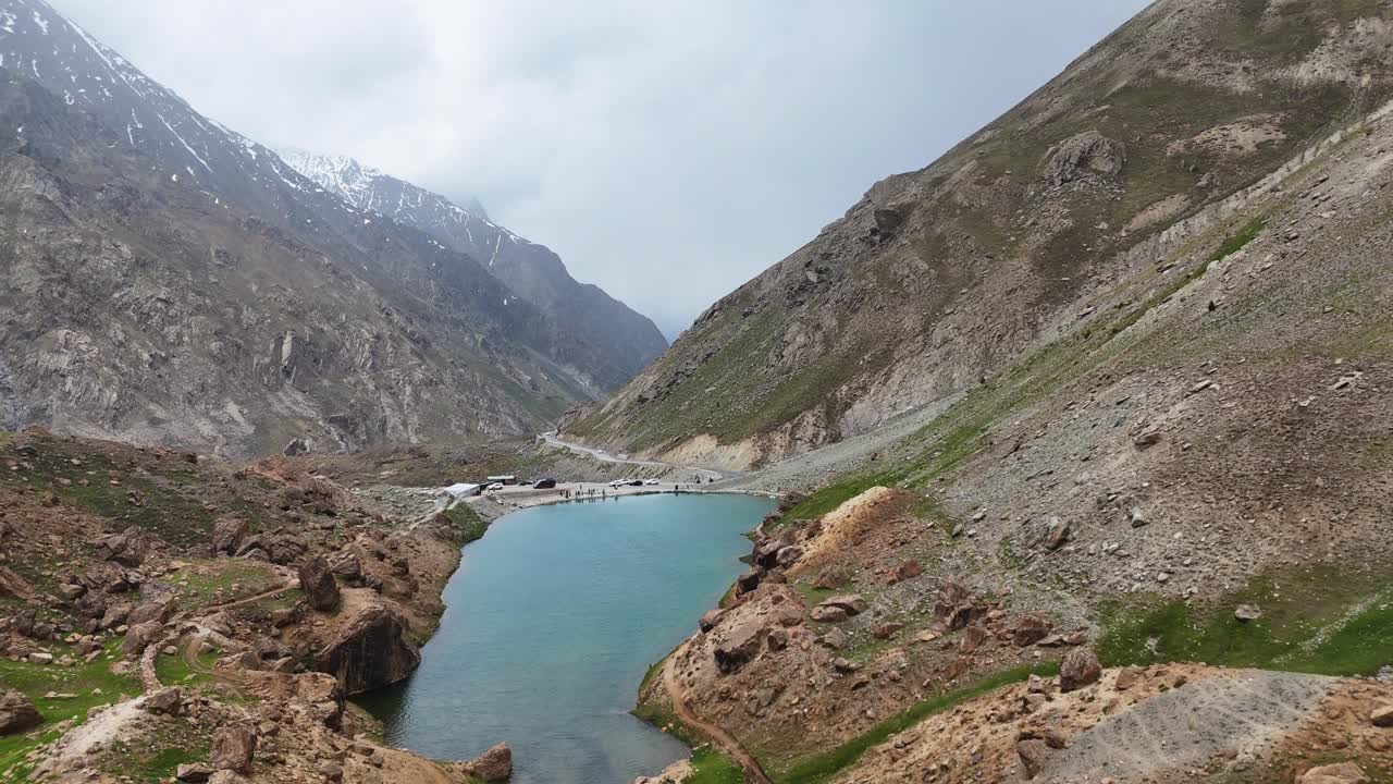 Aerial drone shot highlighting the remote and pristine beauty of Depak Tal in the high Himalayas.