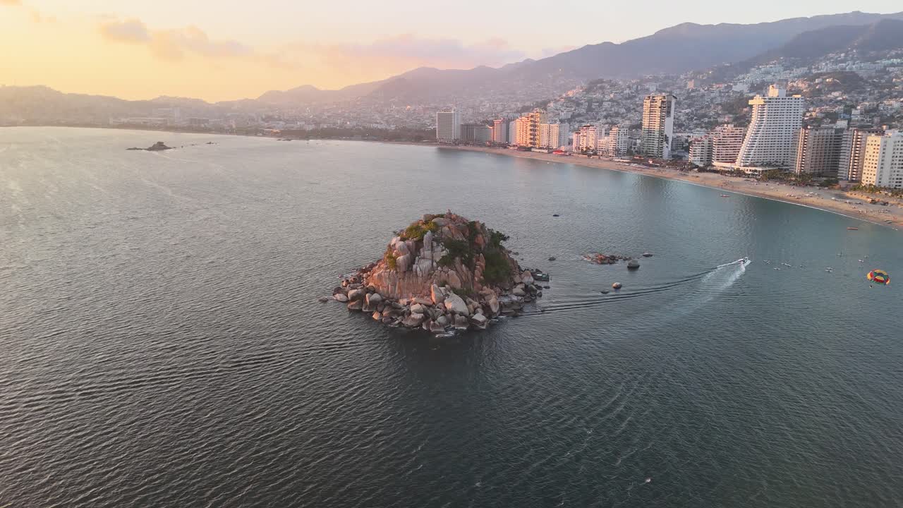 Shot of parachute and relaxing in acapulco mexico