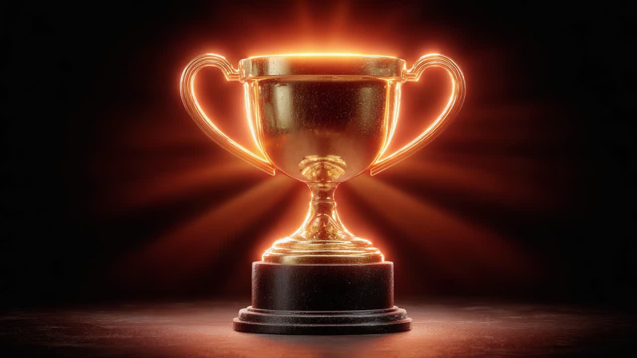 Radiant Golden Trophy Shining Brightly on a Dark Background, Symbolizing Achievement, Recognition, and Excellence in Competitive Sports and Celebrations