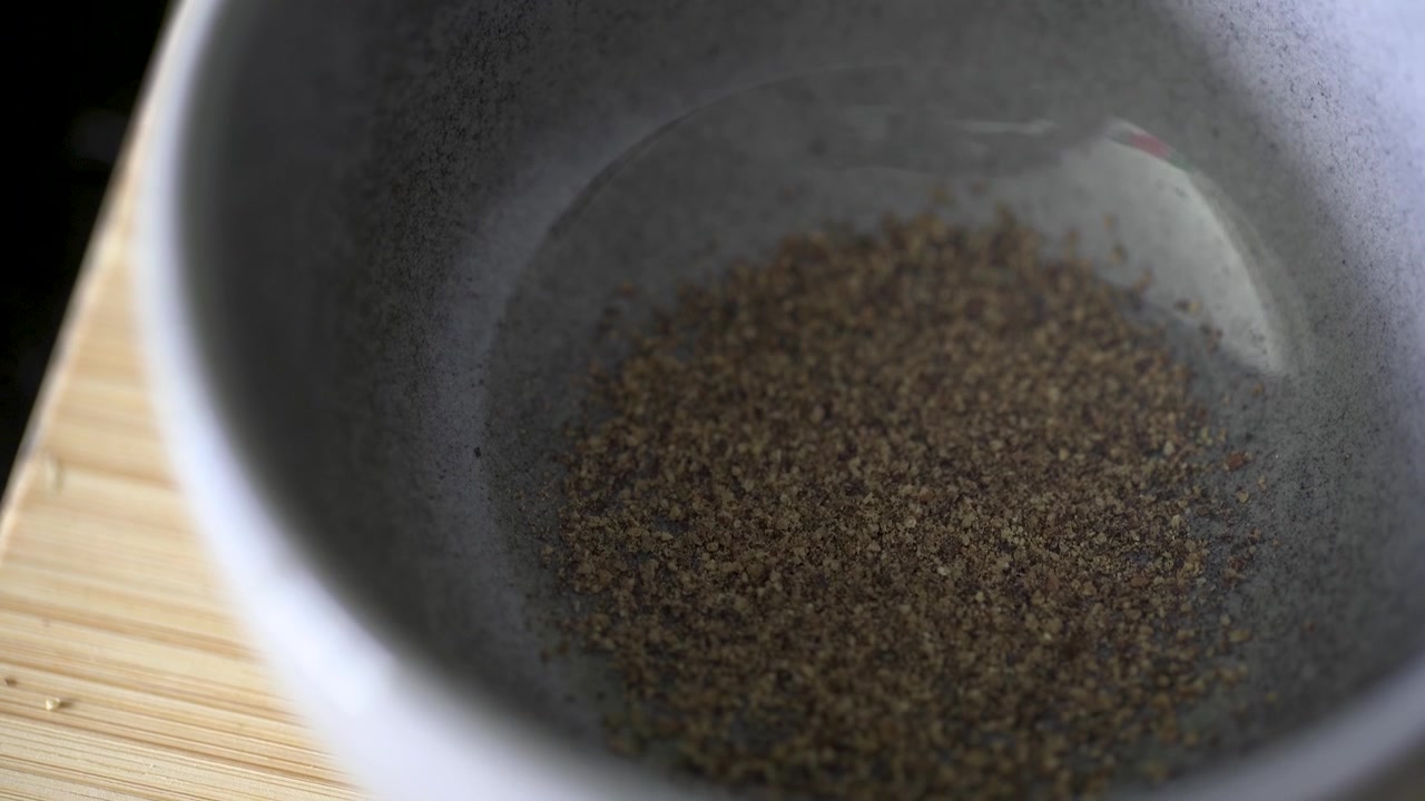 4k Macro close up of pepper in a small dish
