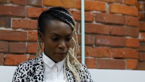 female executive using digital tablet