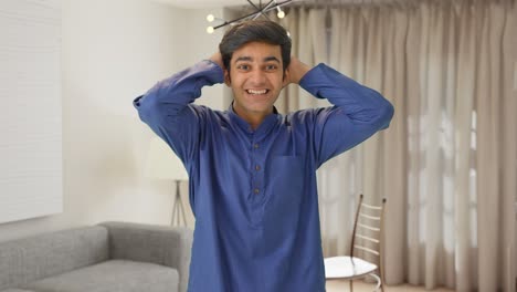 Happy-and-excited-Indian-man-getting-surprised