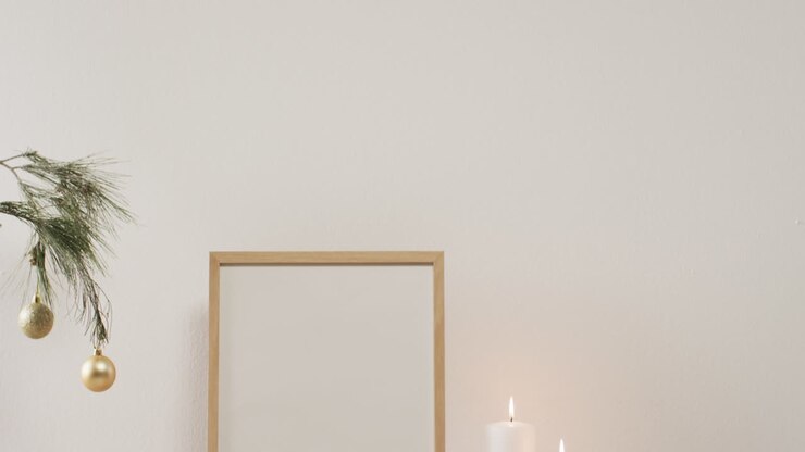 Video of christmas decorations with wooden frame and copy space on white background