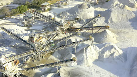 aerial view of a quarry with conveyor belts