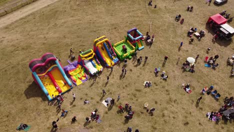 course lock shot of colored inflatable games, playground for kids out in nature