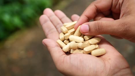 hand holding pills