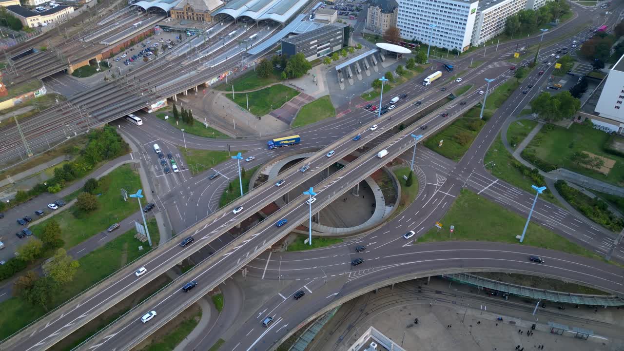 highway roundabout passing over halle saale germany on a cloudy summer day. wide orbit overview drone